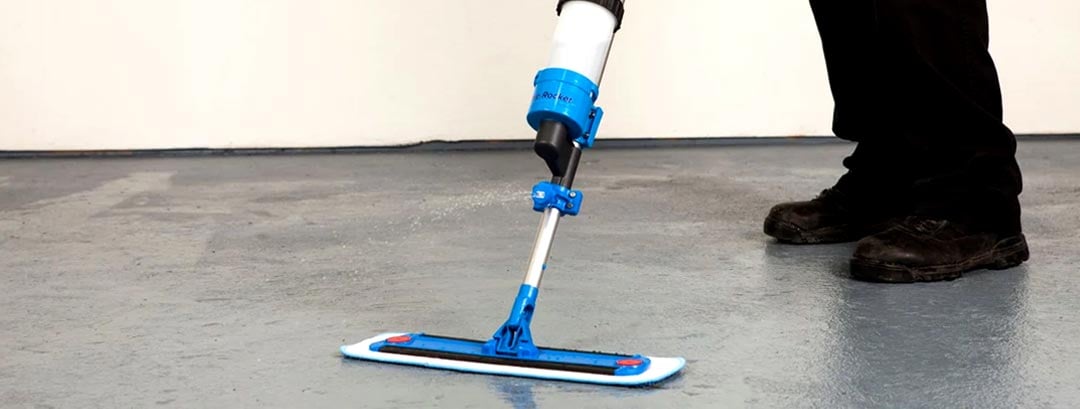 Cleaning floor with Bottle Rocket Mop