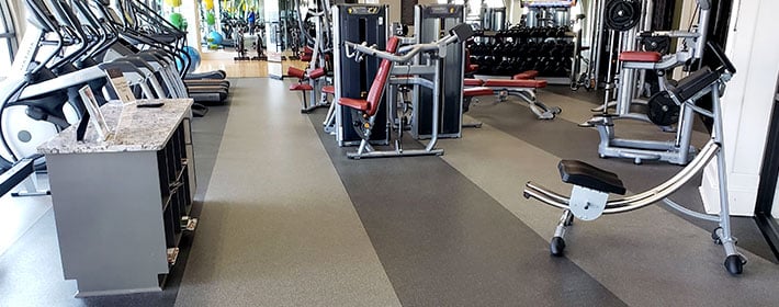 Rolled rubber flooring in a gym.